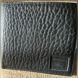 Burberry’s Bifold Wallet. Good pre-owned clean pebbled leather wallet.Have COA!
